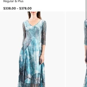 Brand new with tags medium Komarov dress.   Very beautiful l.